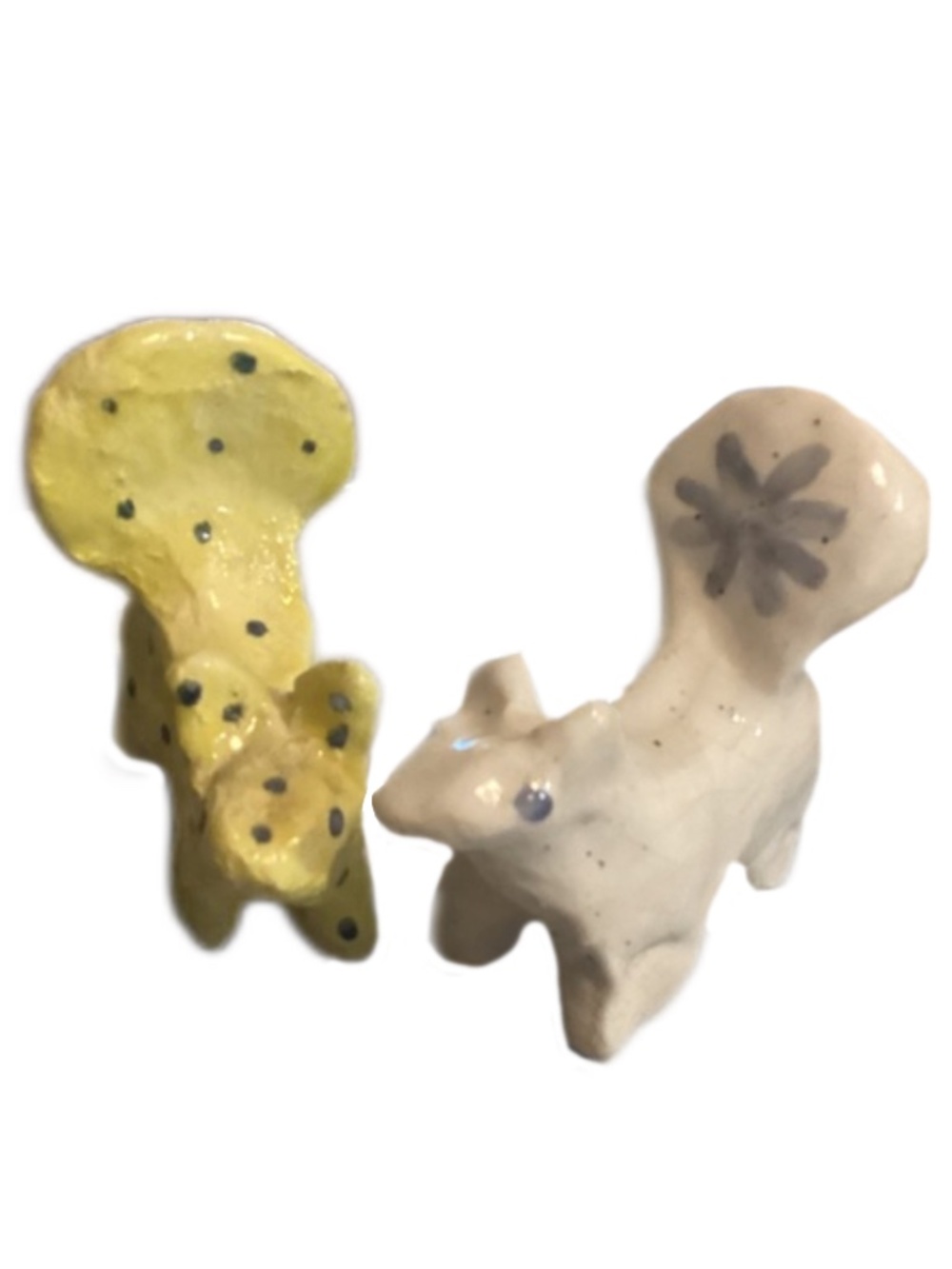 2 Ceramic Folk Art Skunks
